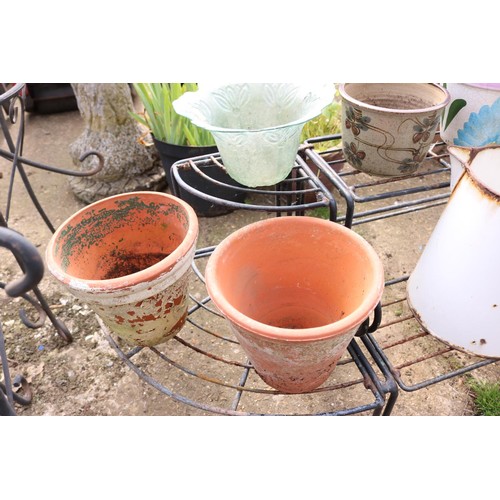 75 - Metal plant stand with various terracotta, glazed pots