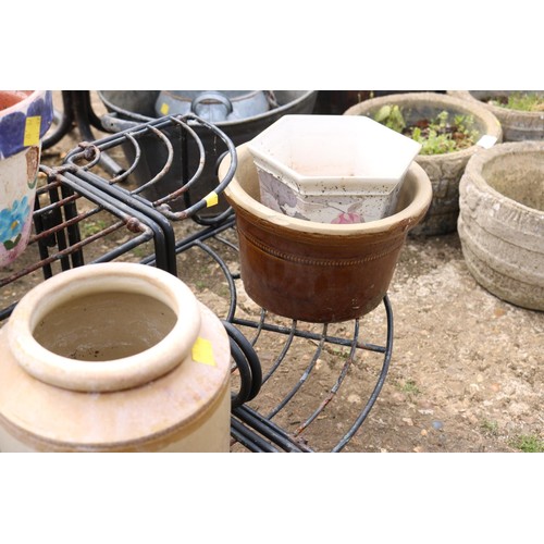 75 - Metal plant stand with various terracotta, glazed pots