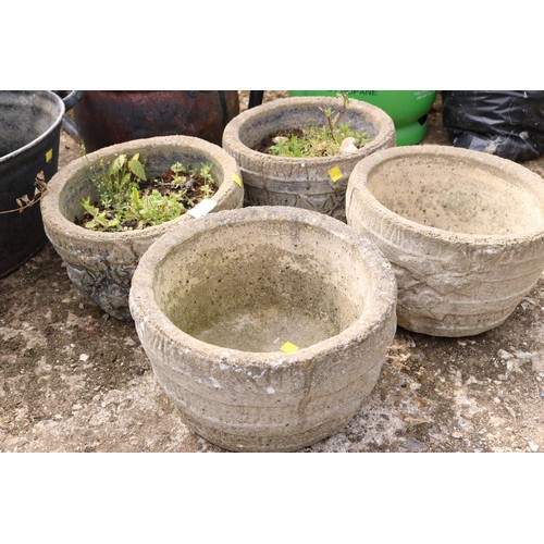 81 - Set of 4 small concrete planters