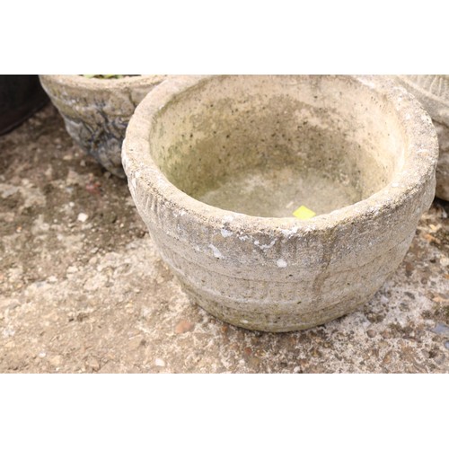 81 - Set of 4 small concrete planters