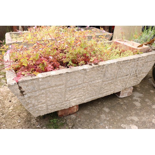 86 - Pair of concrete troughs