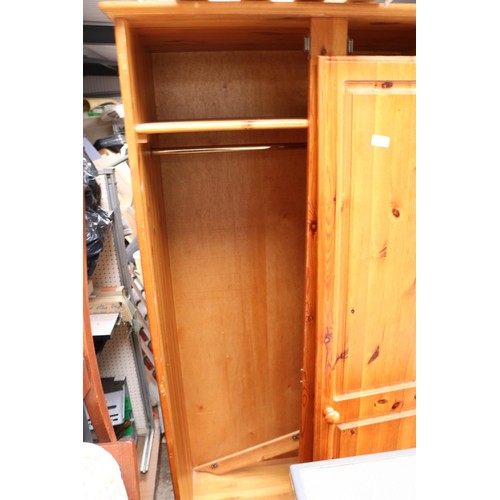 109 - Pine wardrobe - needs re screwing