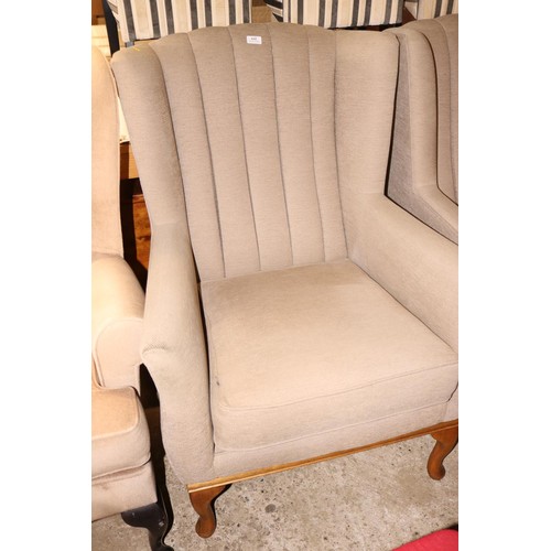 642 - Pair of modern beige wing back armchairs