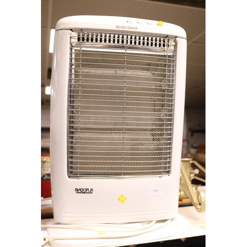 133 - Halogen heater - warranted until 12 noon Tuesday following the above sale