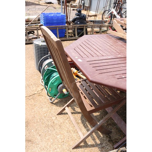 59 - Wooden garden table & 4 chairs