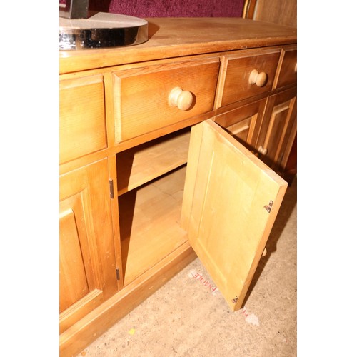 690 - Large pine sideboard with 5 short drawers & 3 cupboards