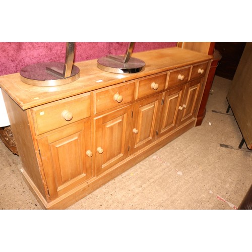 690 - Large pine sideboard with 5 short drawers & 3 cupboards