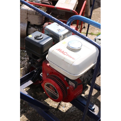 67 - 5.0hp Honda generator on wheels with metal cover (manual in office)