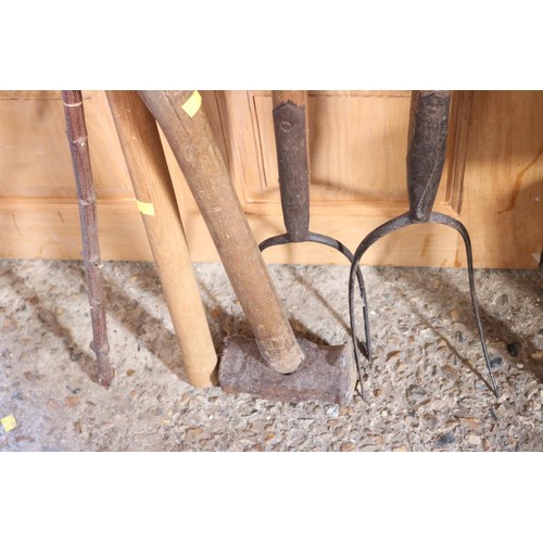 129 - 2 pitch forks, hammer,