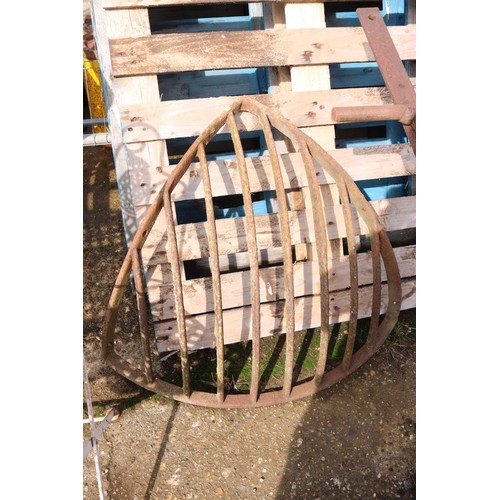 14 - Large wall hanging cast hay rack