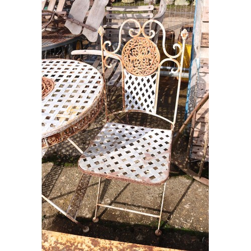 12 - Small lattice, patio table and two folding chairs