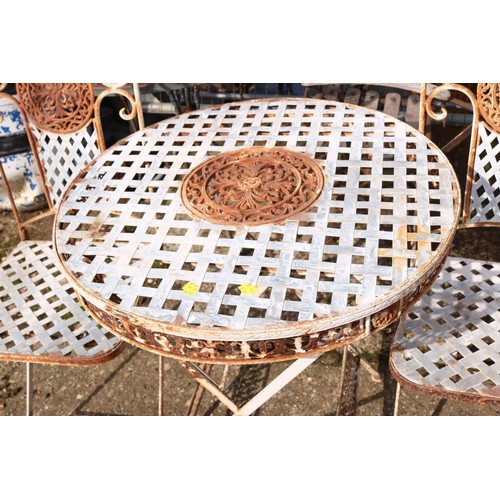 12 - Small lattice, patio table and two folding chairs