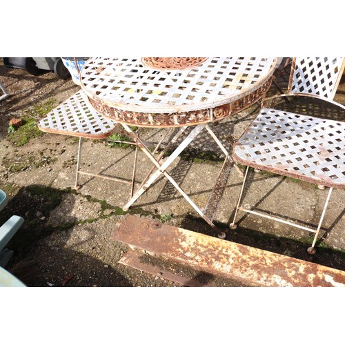 12 - Small lattice, patio table and two folding chairs