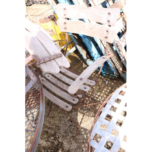 13 - Metal patio table and four folding wooden metal chairs