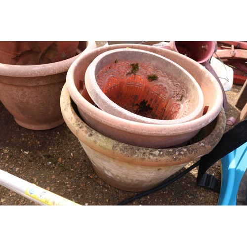 72 - Quantity of cloth pots, some clay, some plastic