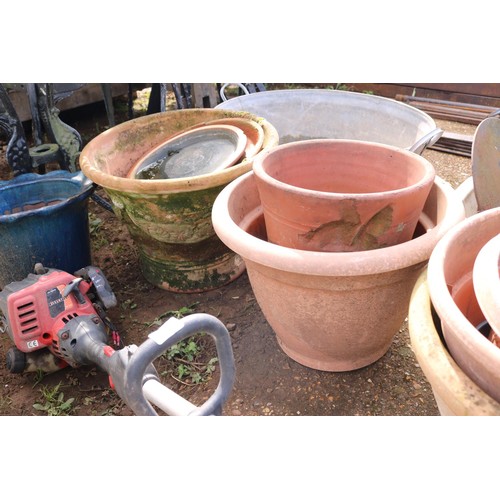 72 - Quantity of cloth pots, some clay, some plastic