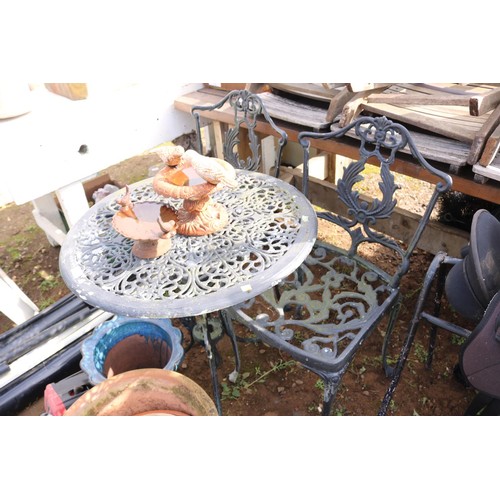 73 - Patio table and two chairs