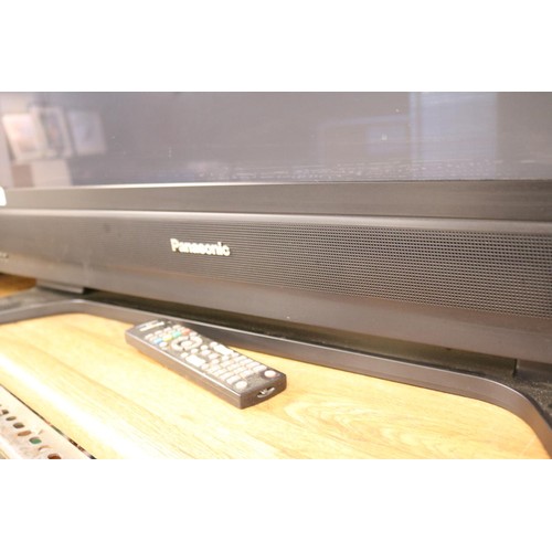 106 - Large Panasonic TV with remote - warranted until 12 noon Tuesday following the above sale