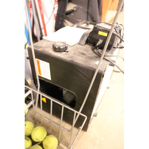 142 - Tennis tutor pro lite machine, balls & collector - warranted until 12 noon Tuesday following the abo... 