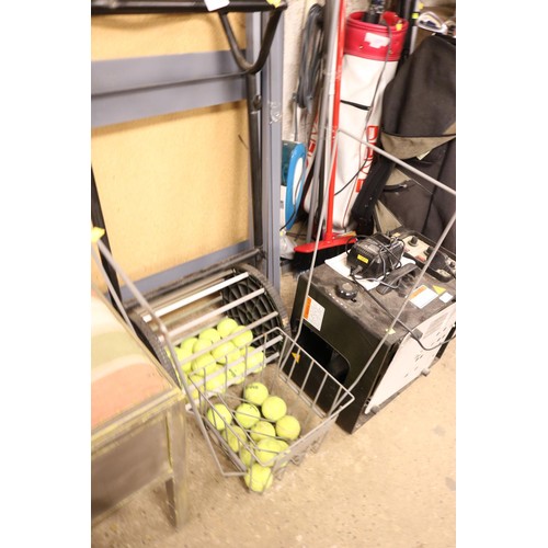 142 - Tennis tutor pro lite machine, balls & collector - warranted until 12 noon Tuesday following the abo... 