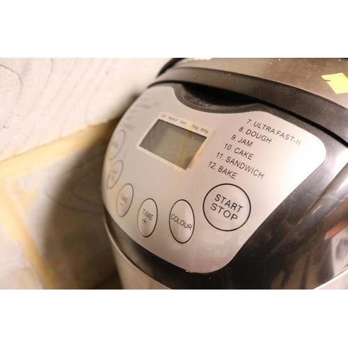 166 - Bread maker - warranted until 12 noon Tuesday following the above sale