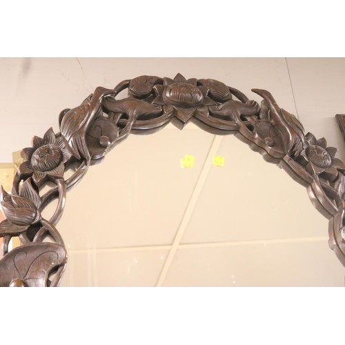 206 - Decorative carved framed mirror