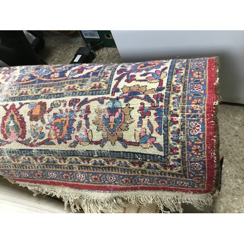 180 - Large patterned carpet, worn