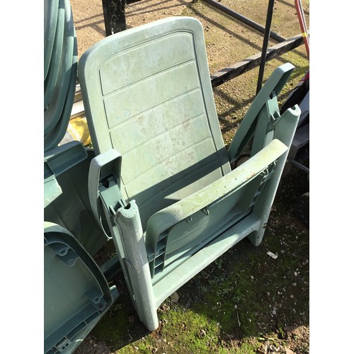 4 - 6 green garden chairs