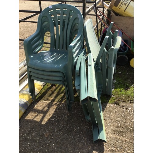 4 - 6 green garden chairs