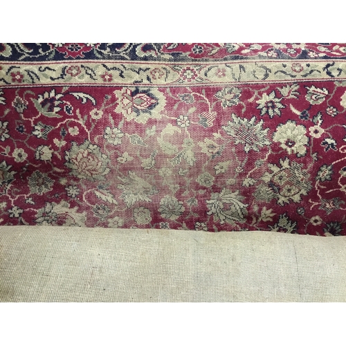 181A - Red patterned carpet, worn