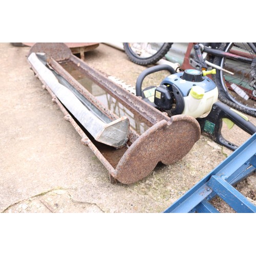 33 - Cast iron trough feeder & 1 other