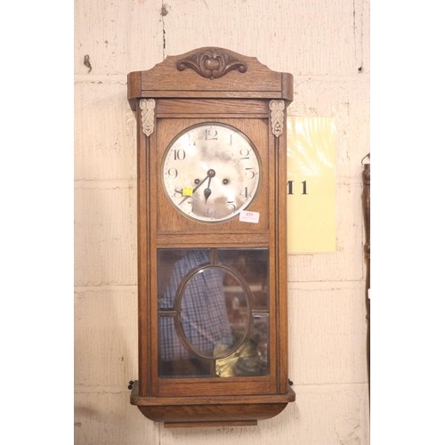 215 - Antique German wall clock & key