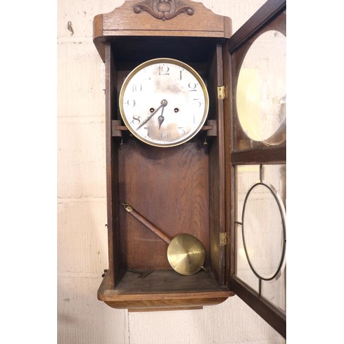 215 - Antique German wall clock & key