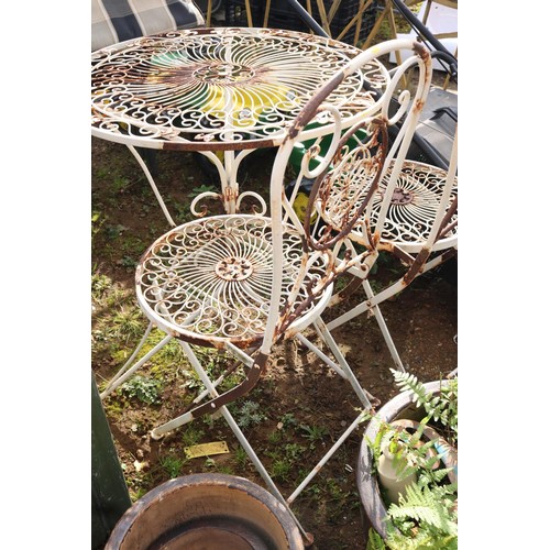 56 - Wrought metal garden table with 2 folding chairs