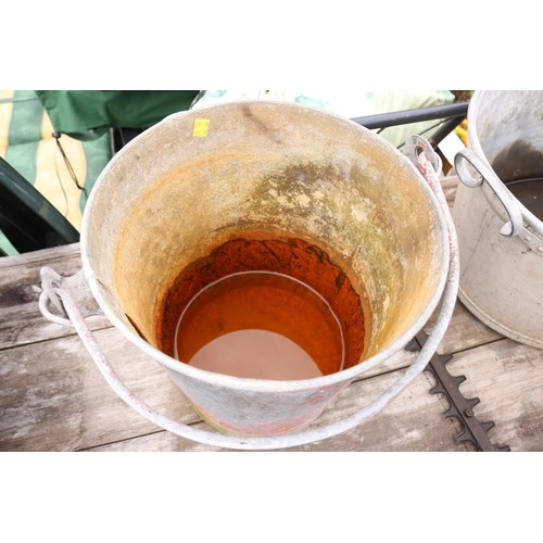 83 - 2 galvanised watering cans with galvanised fire bucket