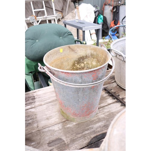 83 - 2 galvanised watering cans with galvanised fire bucket