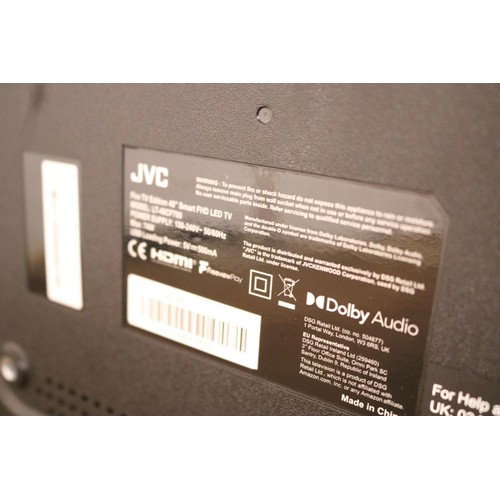 102 - Medium black JVC tv with remote - warranted until 12 noon Tuesday following the above sale