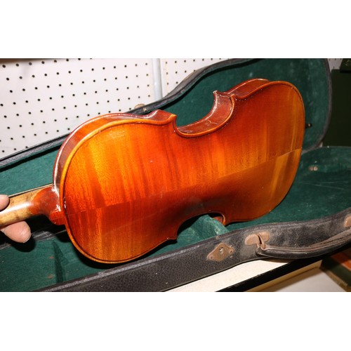 221 - Violin in case