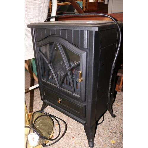 173 - Electric log effect heater - warranted until noon Tues following the above sale