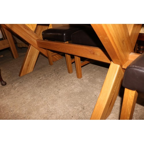 703 - Heavy oak dining table with 6 chairs