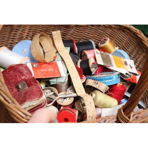 110 - Basket of sewing items & a bag of wool