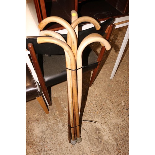 158 - Large collection of walking sticks & umbrellas