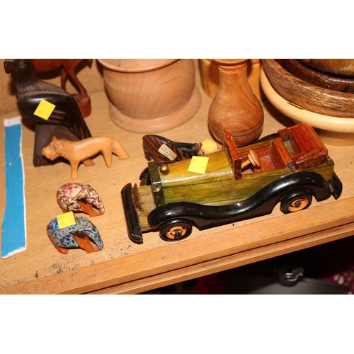 533 - Various wooden items, ebony eagle, car, animals, bowls, etc