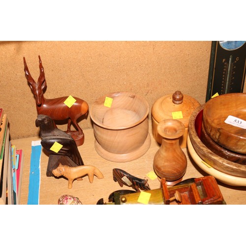 533 - Various wooden items, ebony eagle, car, animals, bowls, etc