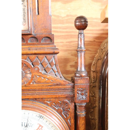 601 - Ornate antique oak carved barometer & themometer