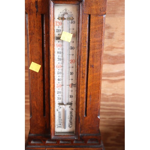601 - Ornate antique oak carved barometer & themometer