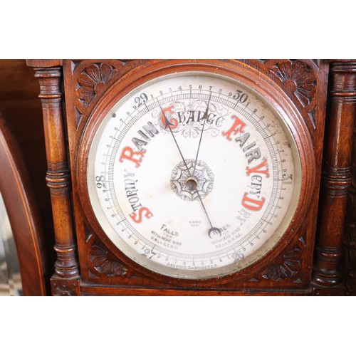 601 - Ornate antique oak carved barometer & themometer