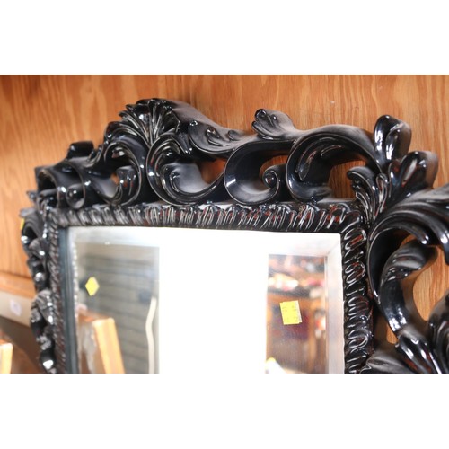 604 - Decorative framed mirror