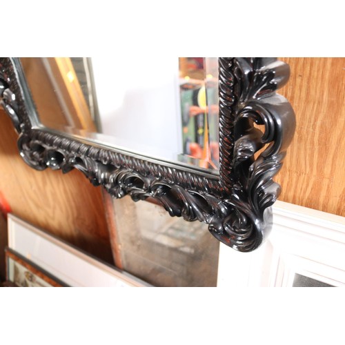604 - Decorative framed mirror