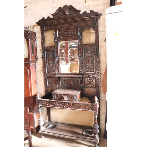 610 - Antique heavily carved oak hall stand
